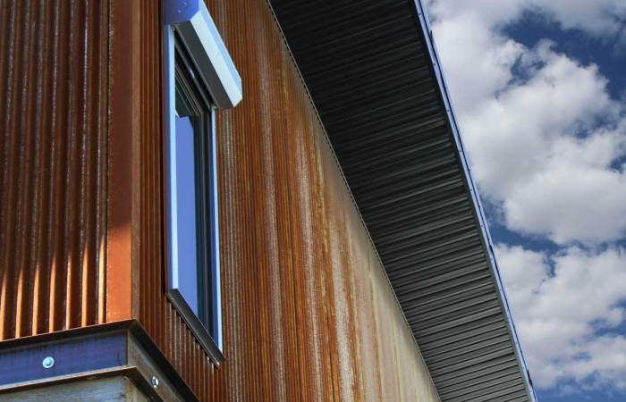 Corrugated steel panels metal siding weathering building commercial